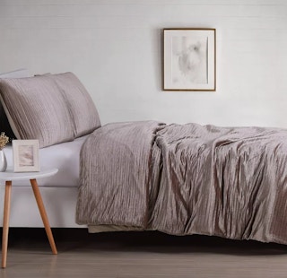grey duvet on a bed