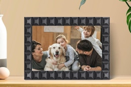 a digital picture frame on a table