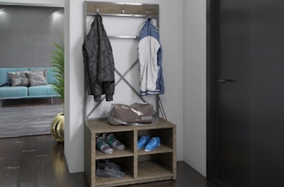 a hall tree with shoe cubbies on the bottom in a home