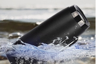 CRLKSSJX Portable Wireless Bluetooth Speaker being dropped into water.