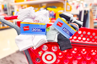 2 hanes kids sock packs sitting on a target cart