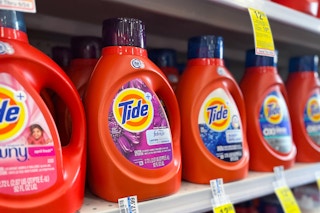 large bottles of tide laundry detergent on a shelf