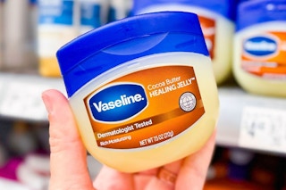 hand holding vaseline healing jelly