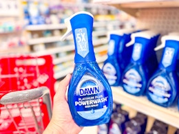 hand holding a dawn powerwash dish spray in front of a target shelf