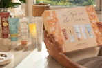 a sunscreen macy's sampler set on a vanity