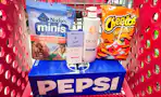 pepsi soda, nudges dog treats, secret deodorant, olay body wash, and cheetos in a cart