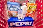 pepsi soda, nudges dog treats, secret deodorant, olay body wash, and cheetos in a cart