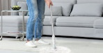 a person using an electric scrubber on the floor
