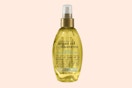a bottle of hair oil spray
