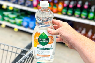 hand holding a bottle of seventh generation dish soap
