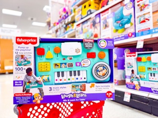 fisher-price dj table sitting on a target basket
