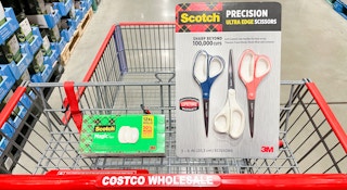tape and scissors in a cart at costco