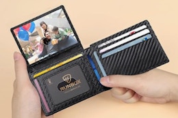 Person holding the RUNBOX Wallet for Men, open.