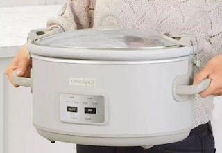 Person carrying the Designer Series Crock-Pot.