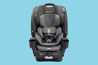 A Graco 5-in-1 car seat on a blue background. 