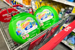 gain flings laundry detergent canisters in a cvs cart