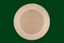 tan round nuloom rug