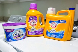 oxi clean and arm & hammer products on a washing machine