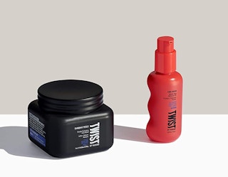 haie products in a orange bottle and black jar