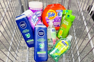 nivea body wash, lysol wipes, tide pods, softsoap hand soap, and garnier shampoo in a cart