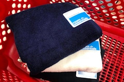 bath towels sitting in a target cart