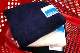 bath towels sitting in a target cart