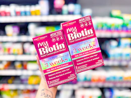 hand holding mybiotin gummies in cvs