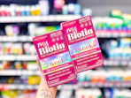 hand holding mybiotin gummies in cvs