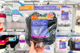 hand holding a 10-pack of hanes women's socks at target