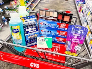 shopping cart with Suave, Gillette, Cerave, Venus, Crest, Maybelline and Covergirl products inside