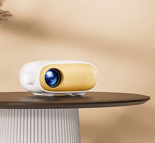 a mini projector on a table