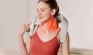 a person using a neck massager