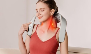 a person using a neck massager