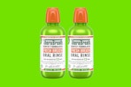 two green bottles of mouthwash