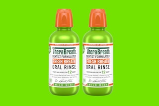 two green bottles of mouthwash