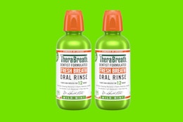 two green bottles of mouthwash
