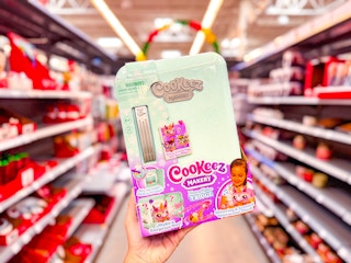hand holding cookeez makery in walmart aisle