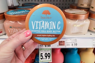 hand holding jar of tree hut whipped body butter at kroger