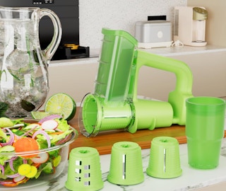 a green cheese grater on a table 