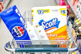 pepsi 12-pack, dove shampoo, and scott toilet paper in a cart