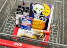 cvs shopping cart with dove, alka-seltzer, covergirl, hallmark, and nivea