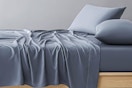 Stock image of the Allswell 6-piece sheet set in the color "shark"