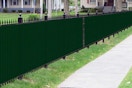 a privacy mesh on a fence