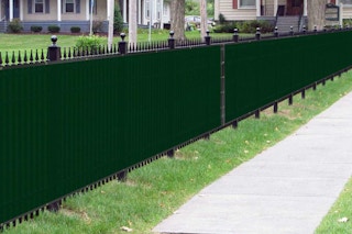 a privacy mesh on a fence