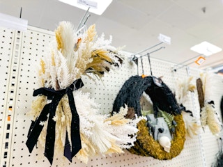 halloween wreaths sitting on a target shelf