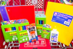 back to school supplies sitting in a target cart