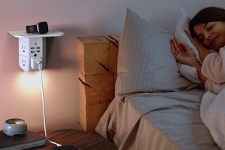 Wall Outlet Extender by a bed