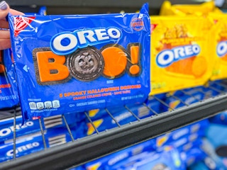 Oreo boo cookies on shelf and in hand