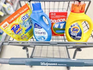 tide simply, bounce, and downy inside cart