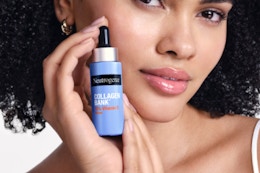 Woman holding Neutrogena Serum